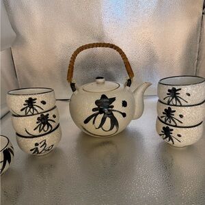 Elegant White and Black Tea Set